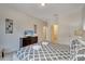 Serene bedroom featuring neutral decor, a large bed, and access to the bathroom at 4328 Acorn Ct, Davenport, FL 33837
