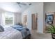 Spacious main bedroom leads to ensuite bathroom and walk-in closet at 463 Kayla Ct, The Villages, FL 32163