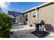 Outdoor patio with a screened lanai and barbecue grill, perfect for entertaining at 463 Kayla Ct, The Villages, FL 32163