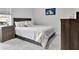 Bedroom featuring carpet, a double bed, and coordinated nightstands at 485 Halter Dr, Apopka, FL 32712