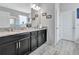 Luxurious main bathroom with dual sinks, granite countertops, and a stylish design at 485 Halter Dr, Apopka, FL 32712