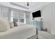 Cozy main bedroom features a stylish dresser, soft carpet, and views of the pool at 485 Halter Dr, Apopka, FL 32712