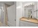 Bathroom with a shower/tub combination, neutral color palette, and single sink vanity at 4920 Sw 4Th Cir, Ocala, FL 34471