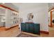 Inviting entryway with console table, decorative mirror, and views into the living spaces at 4920 Sw 4Th Cir, Ocala, FL 34471
