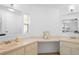Dual sink bathroom with ample counter space and a well-lit vanity at 501 Santa Fe Rd, Tavares, FL 32778