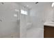 Modern bathroom featuring marble tile floors, glass shower, and soaking tub for a luxurious experience at 5173 Waypointe Blvd, Apopka, FL 32712