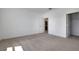 Bright bedroom with carpeted floor, white walls and trim, offering a serene and inviting space at 5173 Waypointe Blvd, Apopka, FL 32712