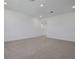 Unfurnished upstairs bedroom featuring plush carpeting and ample natural light at 5173 Waypointe Blvd, Apopka, FL 32712