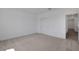 Bright bedroom with carpeted floor, closet, and white walls providing a calming atmosphere at 5173 Waypointe Blvd, Apopka, FL 32712