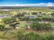 Beautiful golf course and lake community are featured in this aerial image at 602 Camino Real Blvd # 602, Howey In The Hills, FL 34737