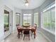 Dining room showcasing the window view and natural light at 602 Camino Real Blvd # 602, Howey In The Hills, FL 34737