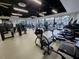 Well-equipped gym with modern exercise machines, weights, and ample space for a complete workout at 6308 Mossy Oak Rd, St Cloud, FL 34771