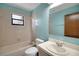 Bathroom featuring a single sink vanity, toilet, and bathtub with a showerhead at 74 Stone Haven Ct, Leesburg, FL 34788