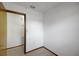 Bedroom featuring neutral walls and carpet with a doorway to an adjacent room at 74 Stone Haven Ct, Leesburg, FL 34788