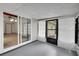 Spacious Florida room with a large sliding door that leads to the living room at 74 Stone Haven Ct, Leesburg, FL 34788