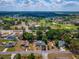 An expansive aerial shot of the neighborhood shows this home's location and community amenities at 8198 Se 164Th Pl, Summerfield, FL 34491