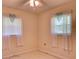 Bedroom with natural light, tile flooring, and a ceiling fan at 10166 Cr 671, Bushnell, FL 33513