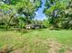 Ranch-style home surrounded by mature trees with ample yard space at 10166 Cr 671, Bushnell, FL 33513
