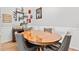 Cozy dining room with a round wooden table, comfortable chairs, and stylish decor at 10339 Patrick Dr, Leesburg, FL 34788