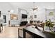 Open concept living area featuring a combined living room, kitchen, and dining space at 10339 Patrick Dr, Leesburg, FL 34788