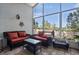 This outdoor patio features tile flooring, seating, and beautiful views at 10339 Patrick Dr, Leesburg, FL 34788