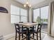 Dining area features a large sliding glass door to the backyard at 1051 Nathan Ridge Rd, Clermont, FL 34715