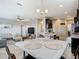 Open concept: dining area blends seamlessly with the kitchen and living room at 1051 Nathan Ridge Rd, Clermont, FL 34715