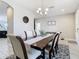 Light and airy dining area with decorative accents and a spacious layout at 1051 Nathan Ridge Rd, Clermont, FL 34715