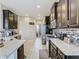 Spacious kitchen with stainless steel appliances, granite countertops, and open layout at 1051 Nathan Ridge Rd, Clermont, FL 34715