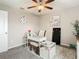 Bright office space with a modern desk, chair, and neutral decor at 1051 Nathan Ridge Rd, Clermont, FL 34715