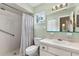 Bathroom featuring a tub, and ample counter space with white cabinets and countertops at 10689 Se 174Th Loop, Summerfield, FL 34491