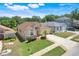 Aerial view of a single-Gathering home with well-maintained landscaping and inviting curb appeal at 1159 Greenley Ave, Groveland, FL 34736