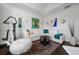 Comfortable living room with a sectional sofa, accent pillows, and modern decor for relaxation at 11860 Se 179Th St, Summerfield, FL 34491