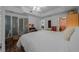 The main bedroom features a dressing area, a large closet, and access to an ensuite bathroom at 11860 Se 179Th St, Summerfield, FL 34491