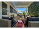 Charming patio space with pergola, outdoor seating, and view of the backyard at 11860 Se 179Th St, Summerfield, FL 34491