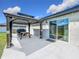 Backyard patio with gazebo with BBQ and picnic table at 11995 Callicarpa Ln, Leesburg, FL 34788