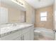 Bathroom featuring tile floors, a shower and tub combination and updated vanity at 12150 Se 88Th Ct, Belleview, FL 34420