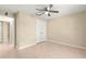 Bedroom with tile flooring, ceiling fan and closet at 12150 Se 88Th Ct, Belleview, FL 34420