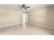 Bedroom featuring tile floors and neutral walls provides an open airy feeling at 12150 Se 88Th Ct, Belleview, FL 34420