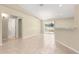 Dining room features tile floors and sliding glass doors to the backyard at 12150 Se 88Th Ct, Belleview, FL 34420