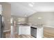 Bright kitchen with modern countertop, stainless steel appliances and open layout for entertaining at 12817 Sw 77Th Cir, Ocala, FL 34473