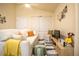 Cozy living room with vaulted ceilings, ceiling fan, comfortable seating, and a neutral color palette at 1282 Cottage Cir, Tavares, FL 32778
