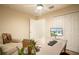 Bright home office featuring modern decor, ceiling fan, and large desk at 1282 Cottage Cir, Tavares, FL 32778