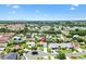 Neighborhood aerial view showcasing home's location, landscaping, and surrounding community amenities at 1306 Pedro Ct, The Villages, FL 32159