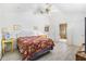 Spacious main bedroom with high ceilings, tiled floors and ensuite bathroom at 1306 Pedro Ct, The Villages, FL 32159
