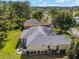 An aerial view of the home and its well-manicured back yard at 13190 Se 93Rd Cir, Summerfield, FL 34491
