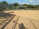 Baseball field featuring a dugout and fenced outfield, perfect for recreational activities at 13190 Se 93Rd Cir, Summerfield, FL 34491