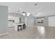 Open concept kitchen features tile floors, lots of natural light, and modern appliances at 132 Palermo Pl, The Villages, FL 32159