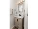 Modern bathroom featuring a stylish vanity, sleek fixtures, and neutral color scheme for a clean aesthetic at 1704 Hoofprint Court, Fruitland Park, FL 34731
