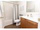 Cozy bathroom featuring a shower and tub combination and neutral colors for a relaxing experience at 1704 Hoofprint Court, Fruitland Park, FL 34731